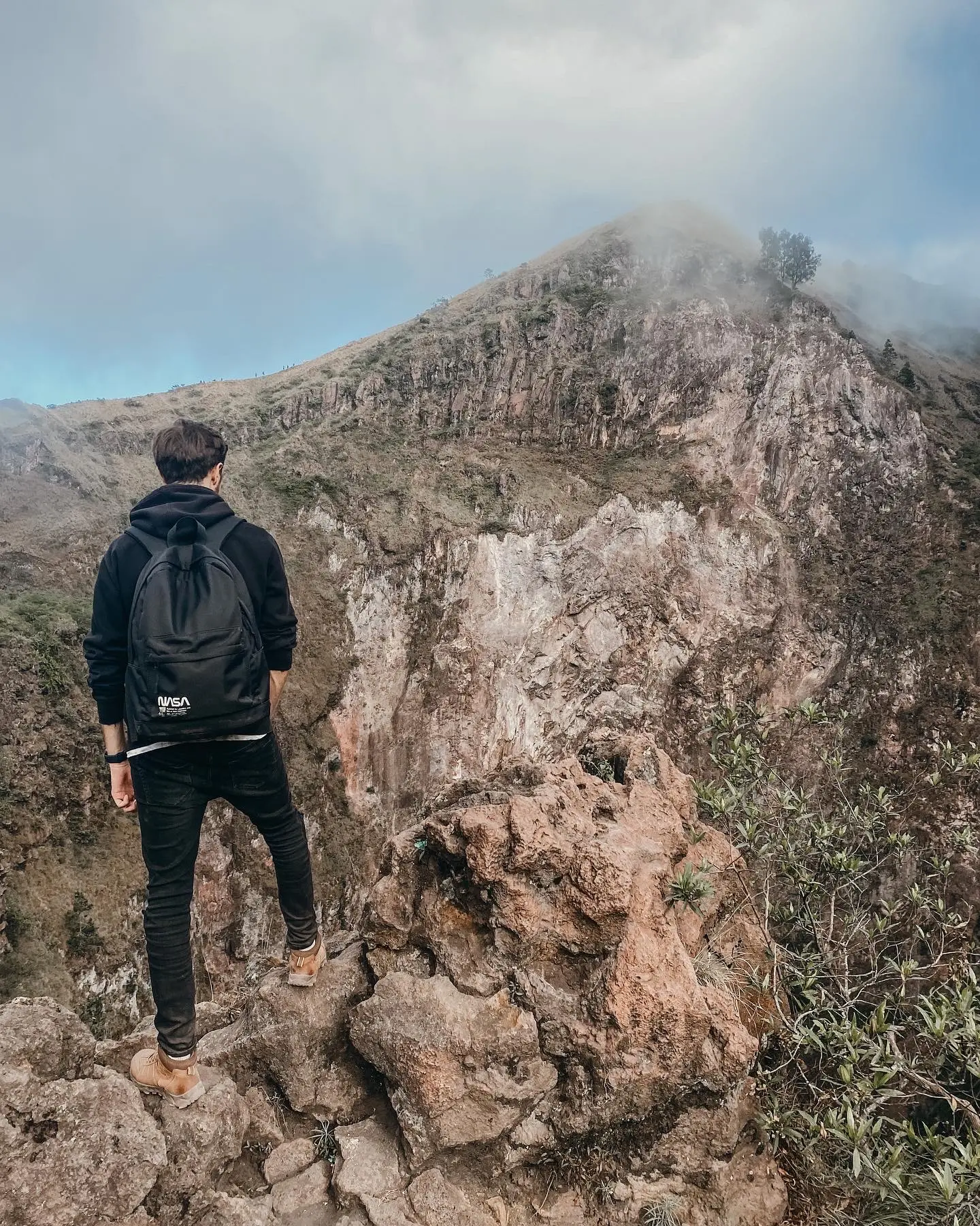 Roman looking at a volcanic mountain